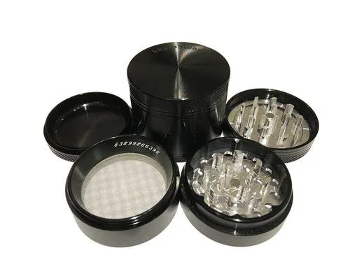 Black four-piece aluminium herb shredder, 2.2 inch diameter, hard-top design with magnetic closure