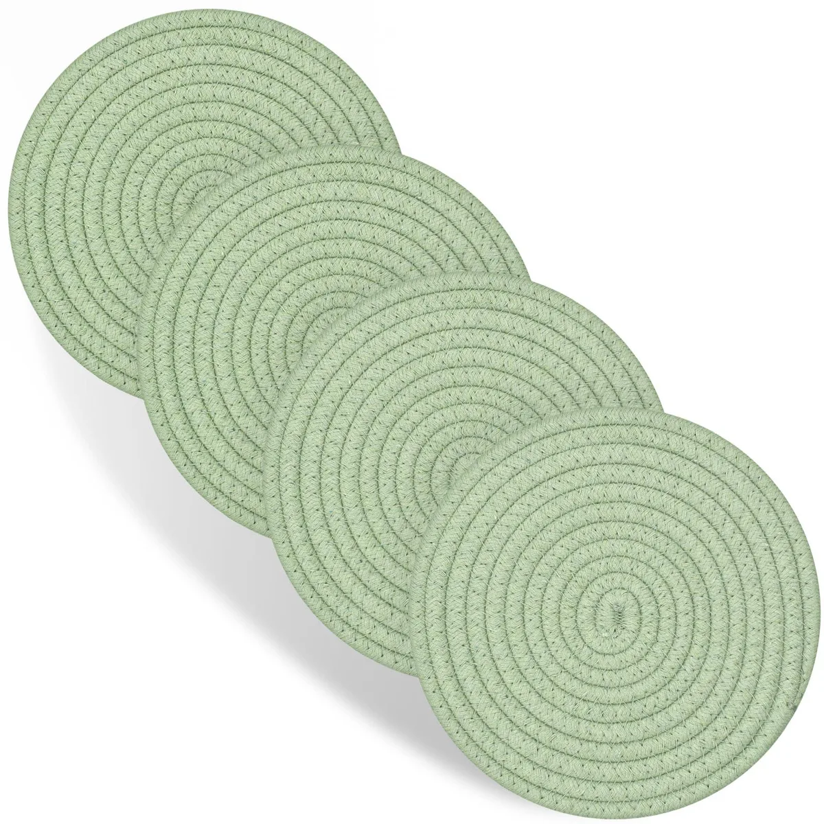 Four green hand-woven cotton trivets, eight inches wide and point three two inches thick