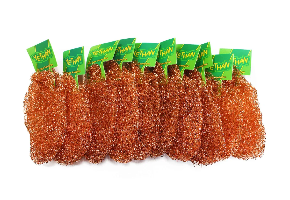 Ten copper scouring pads in a rectangular pack