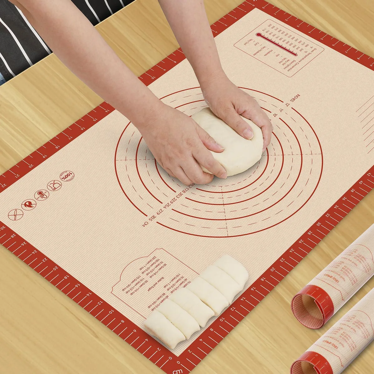 Large rectangular silicone pastry mat, light checkered surface with printed measurements, 26 by 16 inches