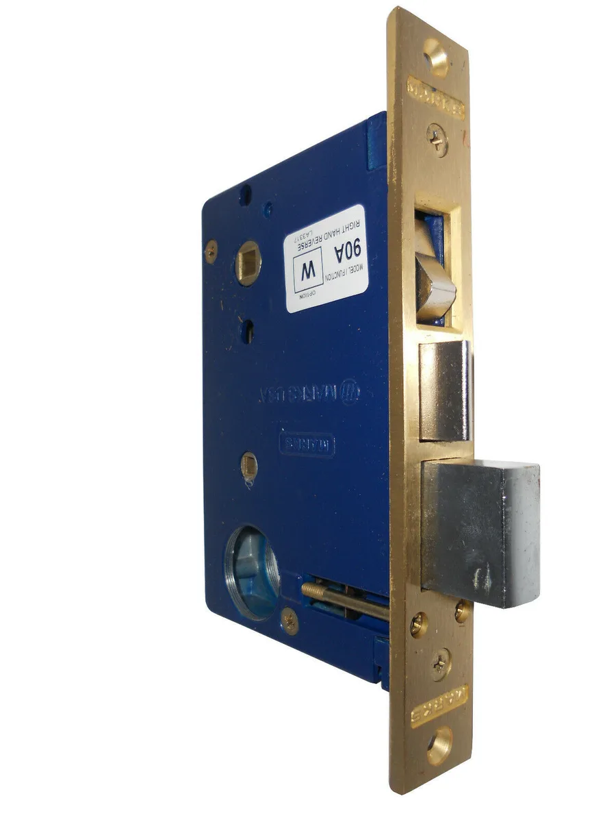 Polished brass mortise lock body, right hand reverse, faceplate 1 by 7-1/8 inches