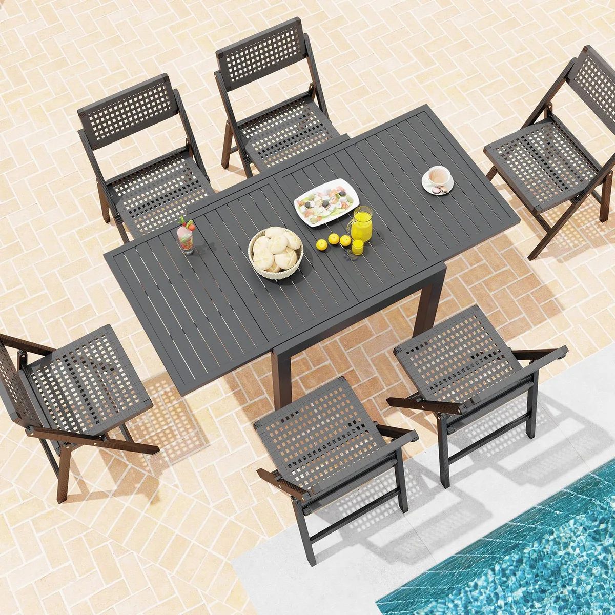 Grey expandable patio dining table with slatted aluminium top and metal legs