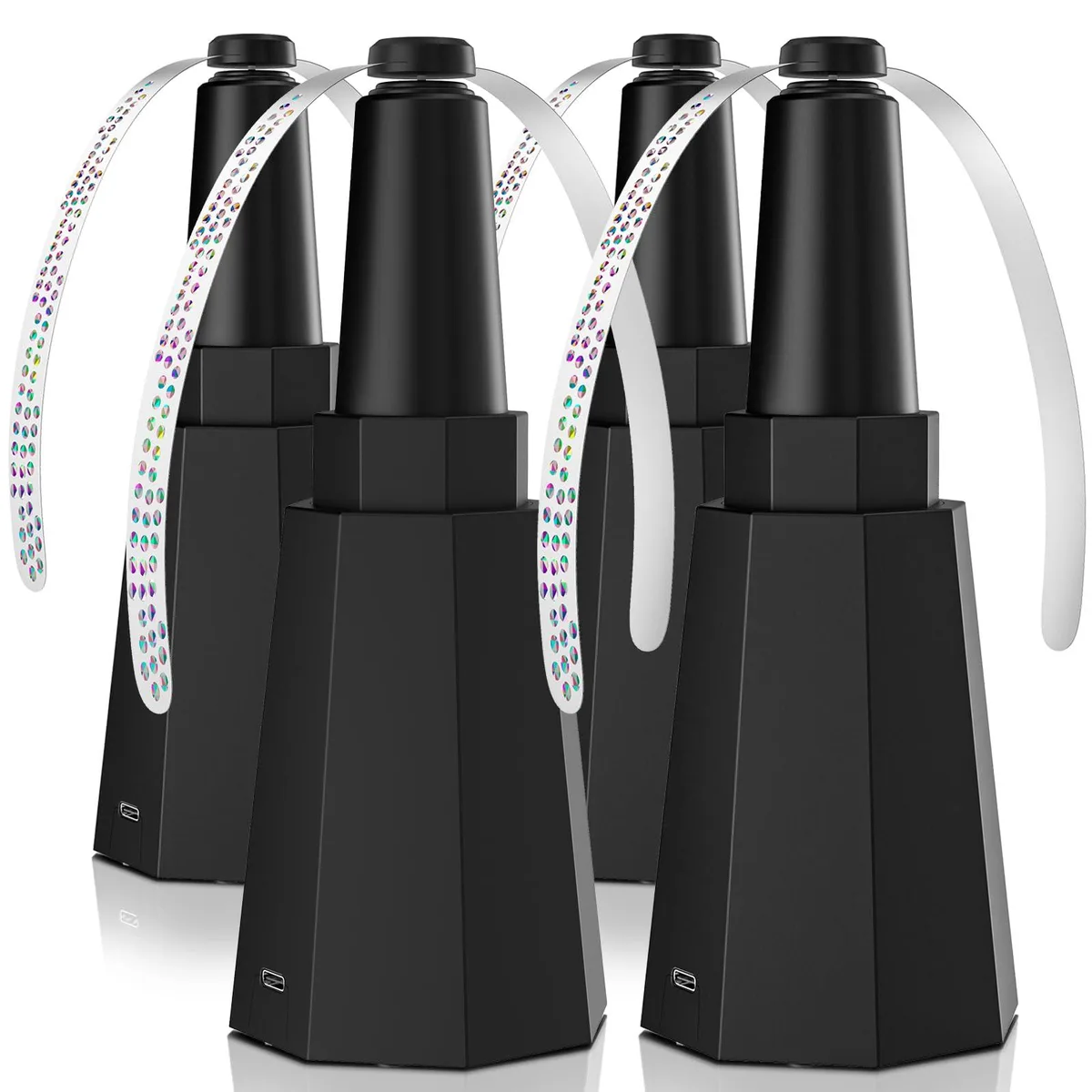 Four black collapsible table fans with silver blades and hooks, folded and extended side by side