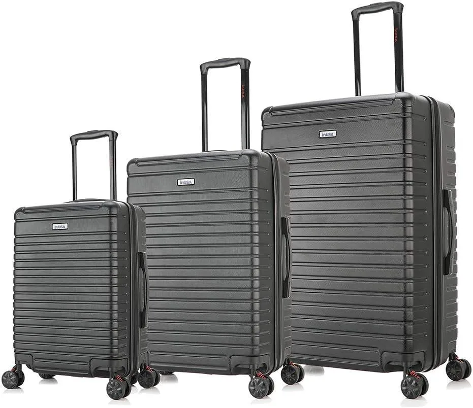 Three black hardside suitcases in 20, 24, 28 inch sizes with micro-diamond finish and spinner wheels