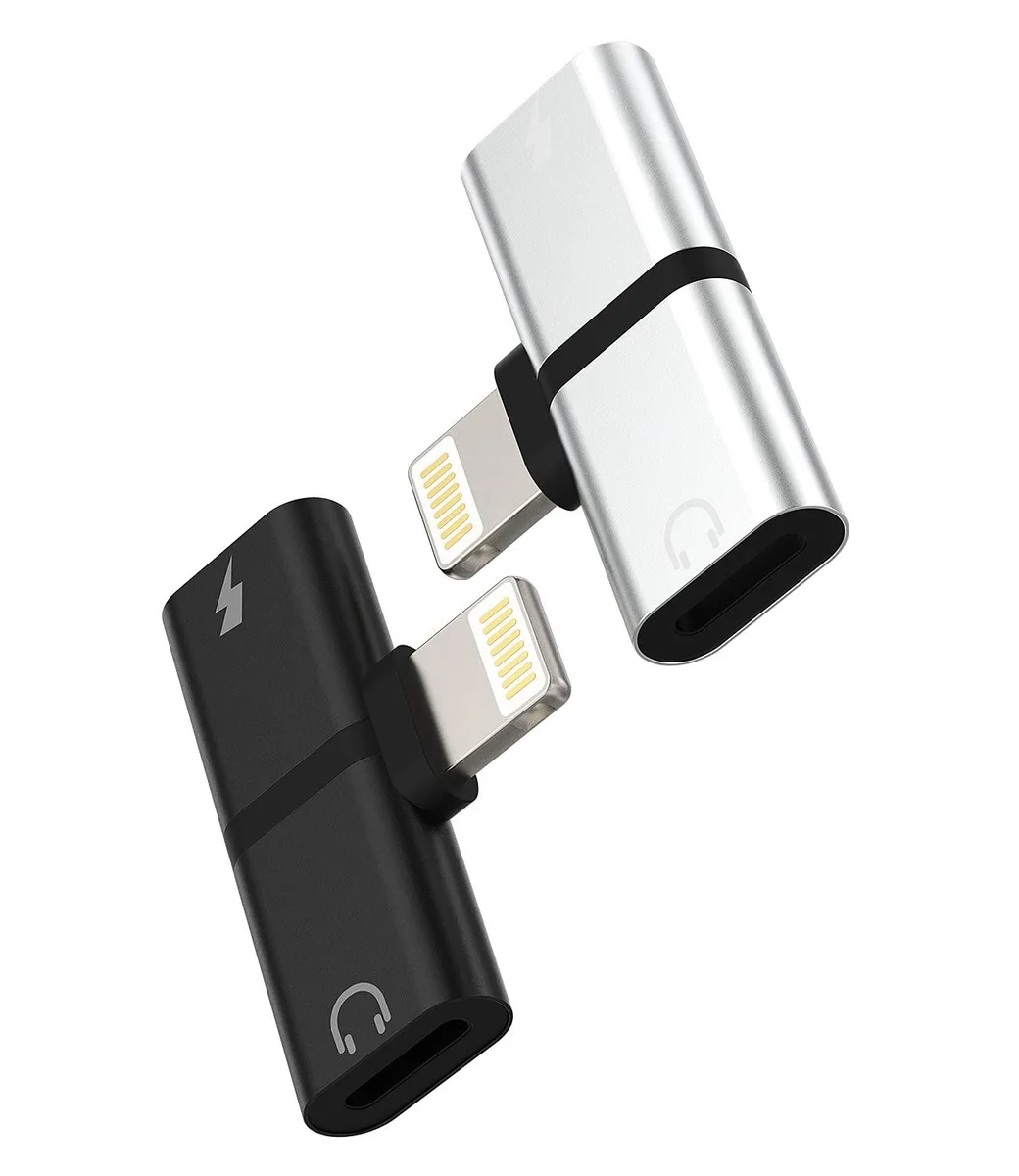 Two white Lightning headphone adapters with dual ports for charging and audio