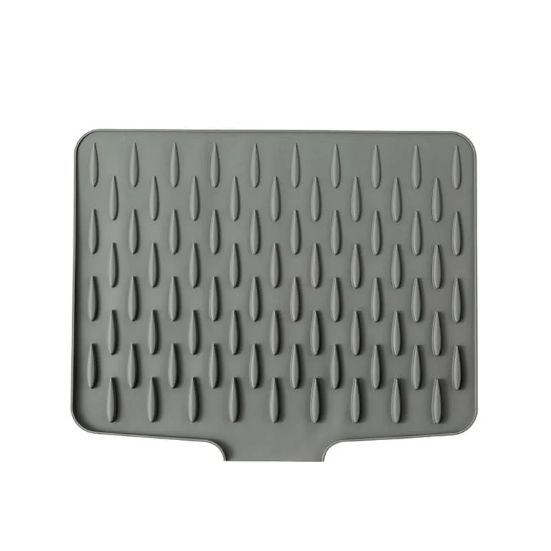 Gray waterdrop-shaped silicone mat with droplet drainage channels and textured surface