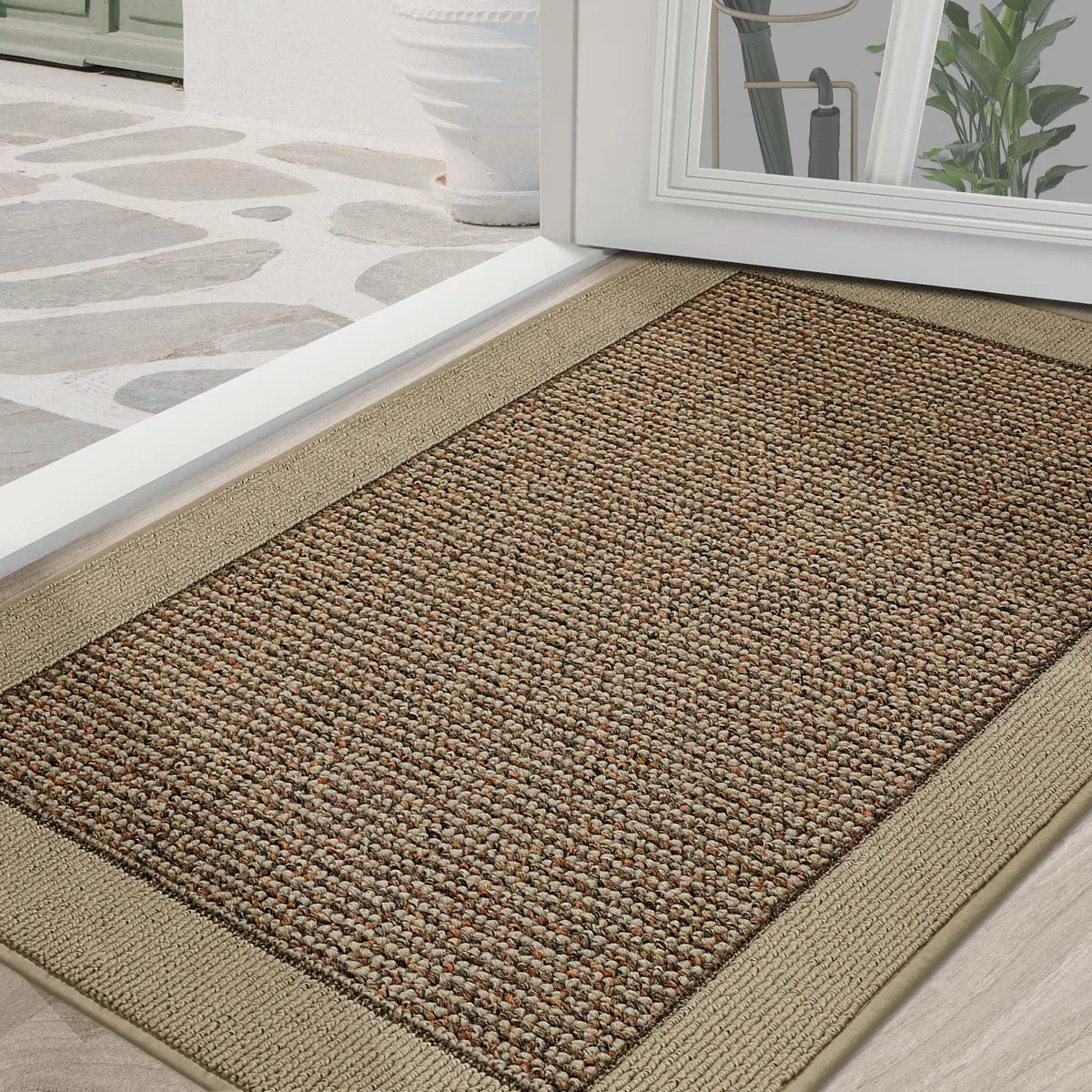Rectangular taupe door mat with striped pattern and low-profile construction