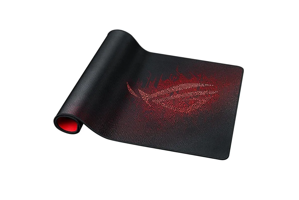 Extra-large black cloth mouse pad with red stitched edges, non-slip rubber base, 35.4 by 17.3 inches