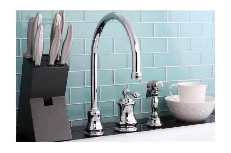 KINGSTON BRASS KINGSTON BRASS Single Handle Widespread Kitchen Faucet with Brass Sprayer Polished Chrome — product photo