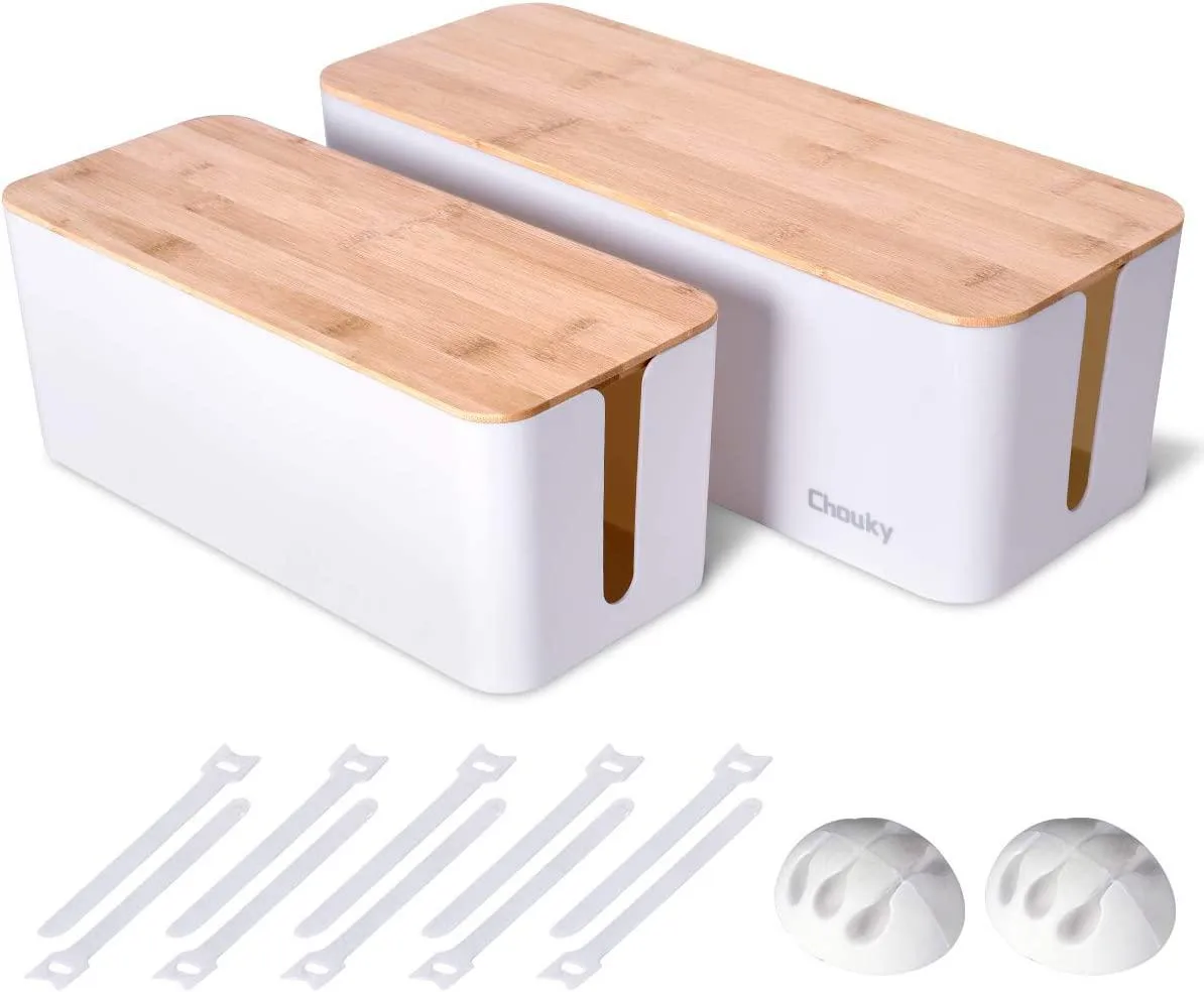 Two white cable boxes with wood-grain lids, one large one medium, plus ties clips and sleeve