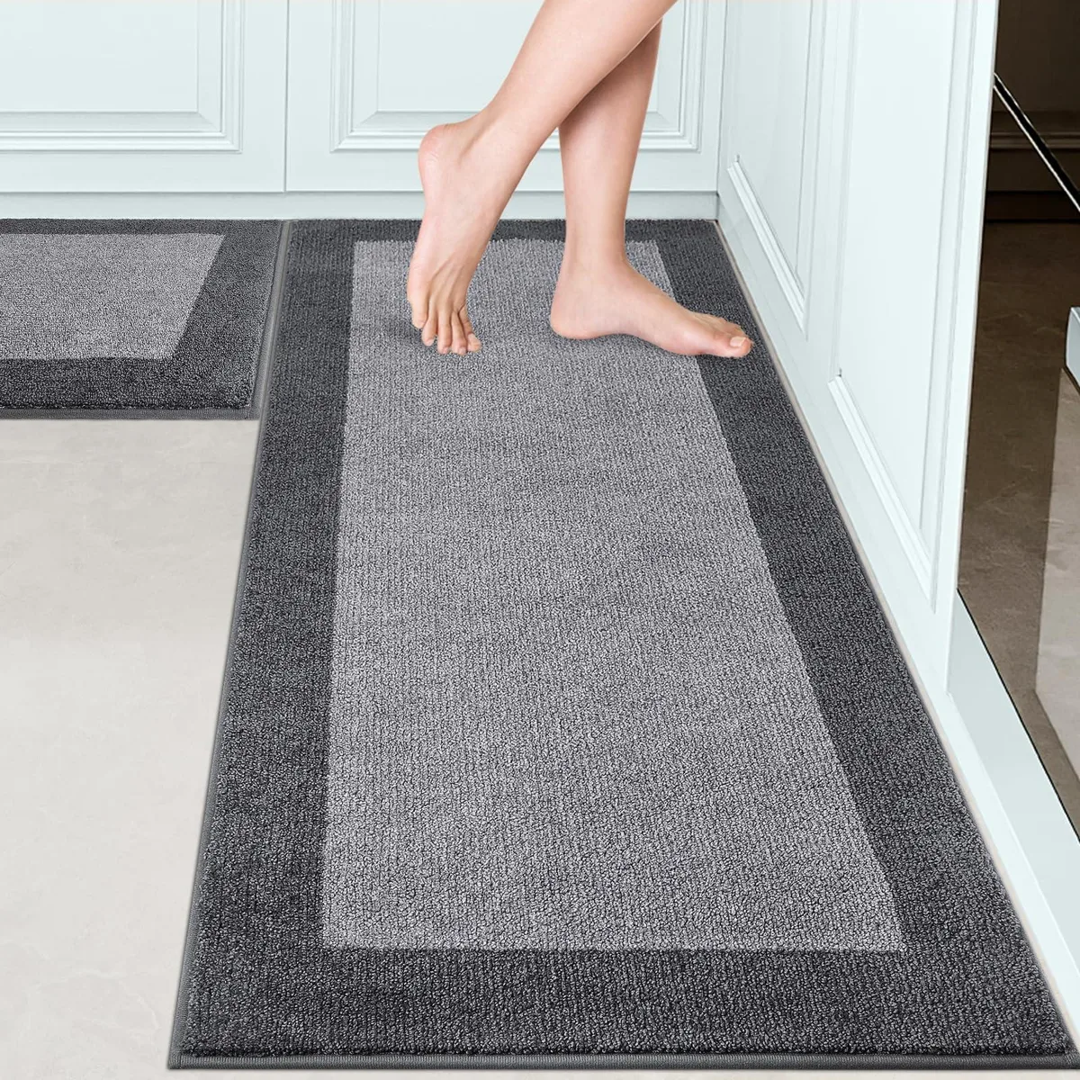 Two grey rectangular bamboo mats, striped pattern, 24 by 36 and 24 by 60 inches
