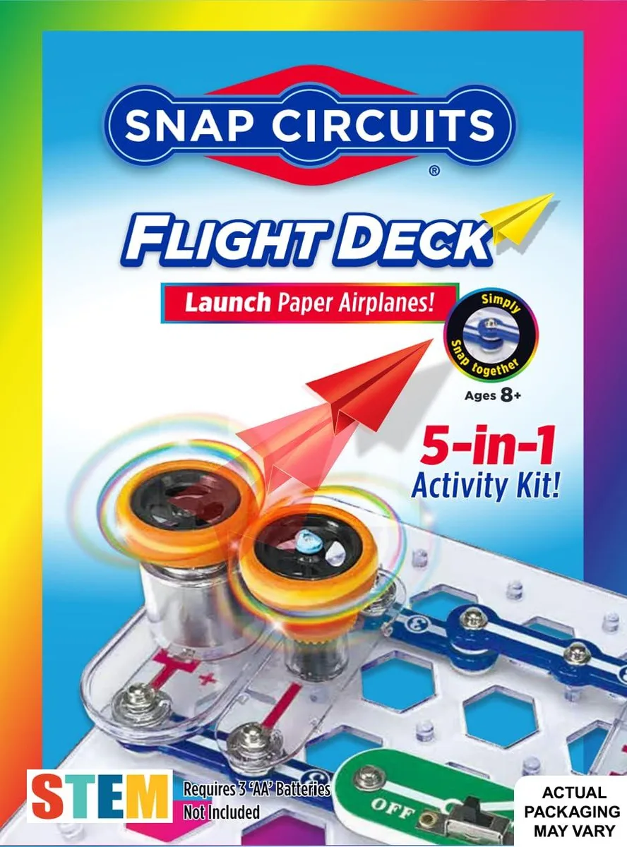 Black rectangular box showing illustrated paper planes and flying saucers, plastic parts visible inside