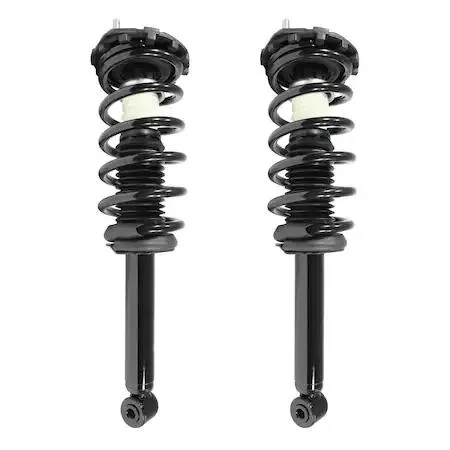 Two complete rear strut assemblies with springs and mounts, silver finish