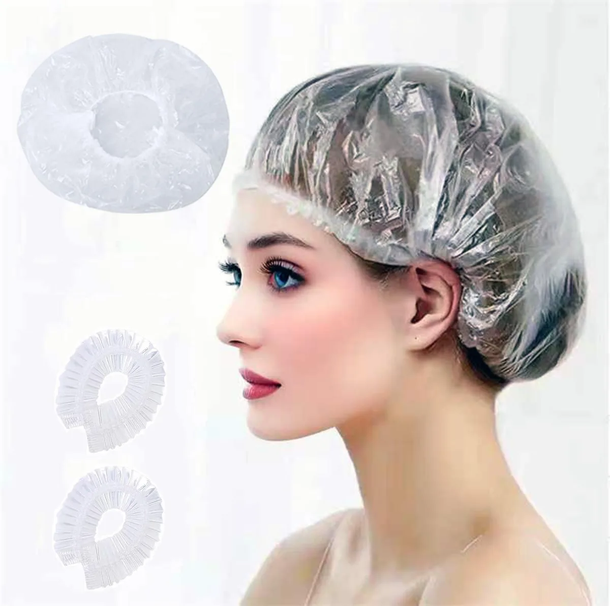 Clear plastic shower caps in a bulk pack of 200, each stretching to 18.1 inches with elastic band