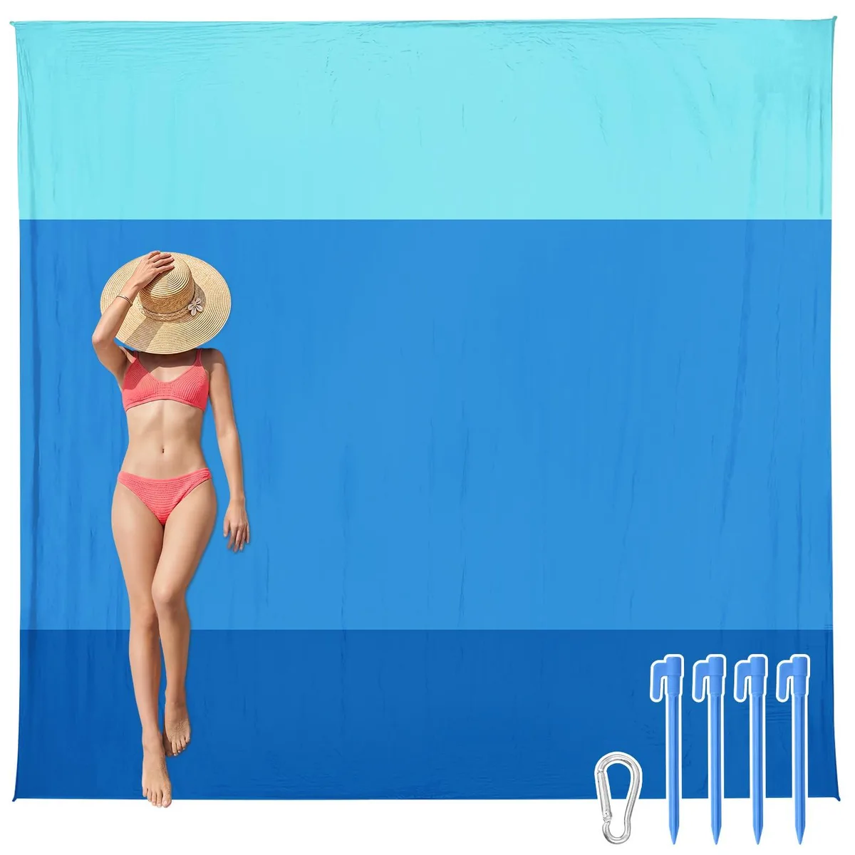 Green square polyester beach blanket with corner pockets and stakes folded in carry bag