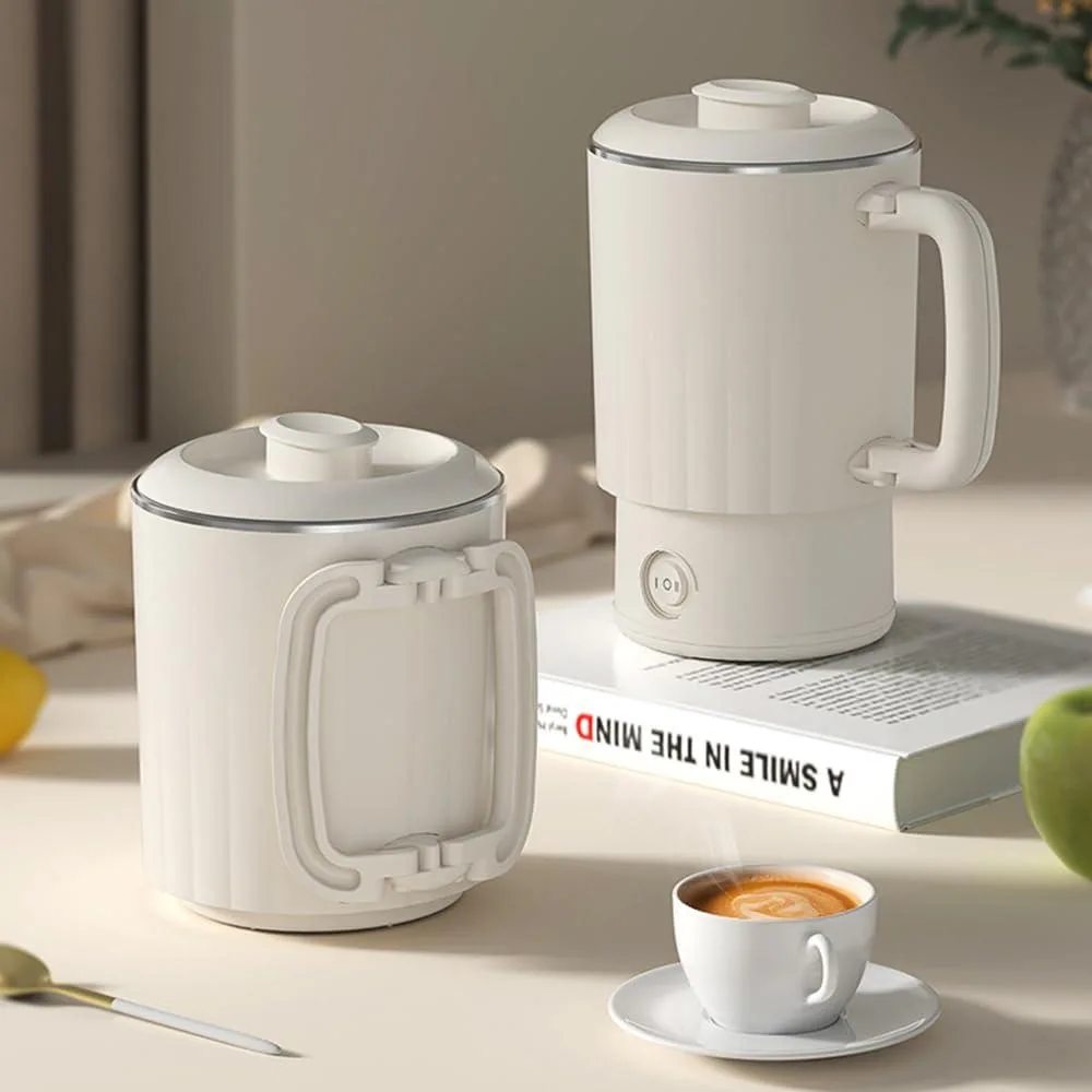 Beige collapsible silicone kettle with stainless steel base, foldable handle, compact travel size