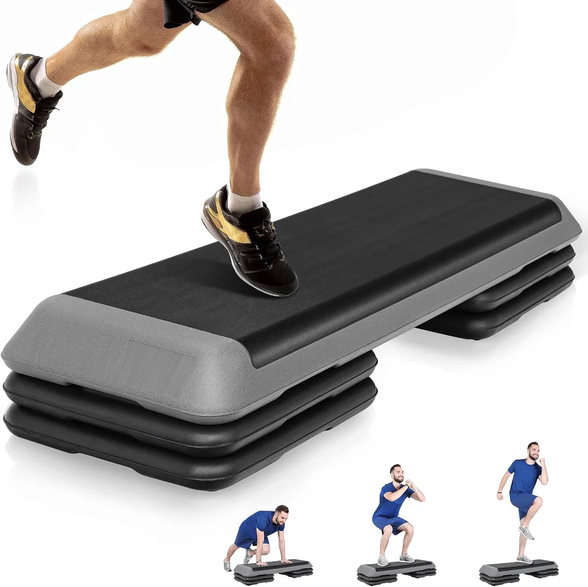 Rectangular black aerobic step platform, 43 by 16 inches, with four stackable risers attached underneath