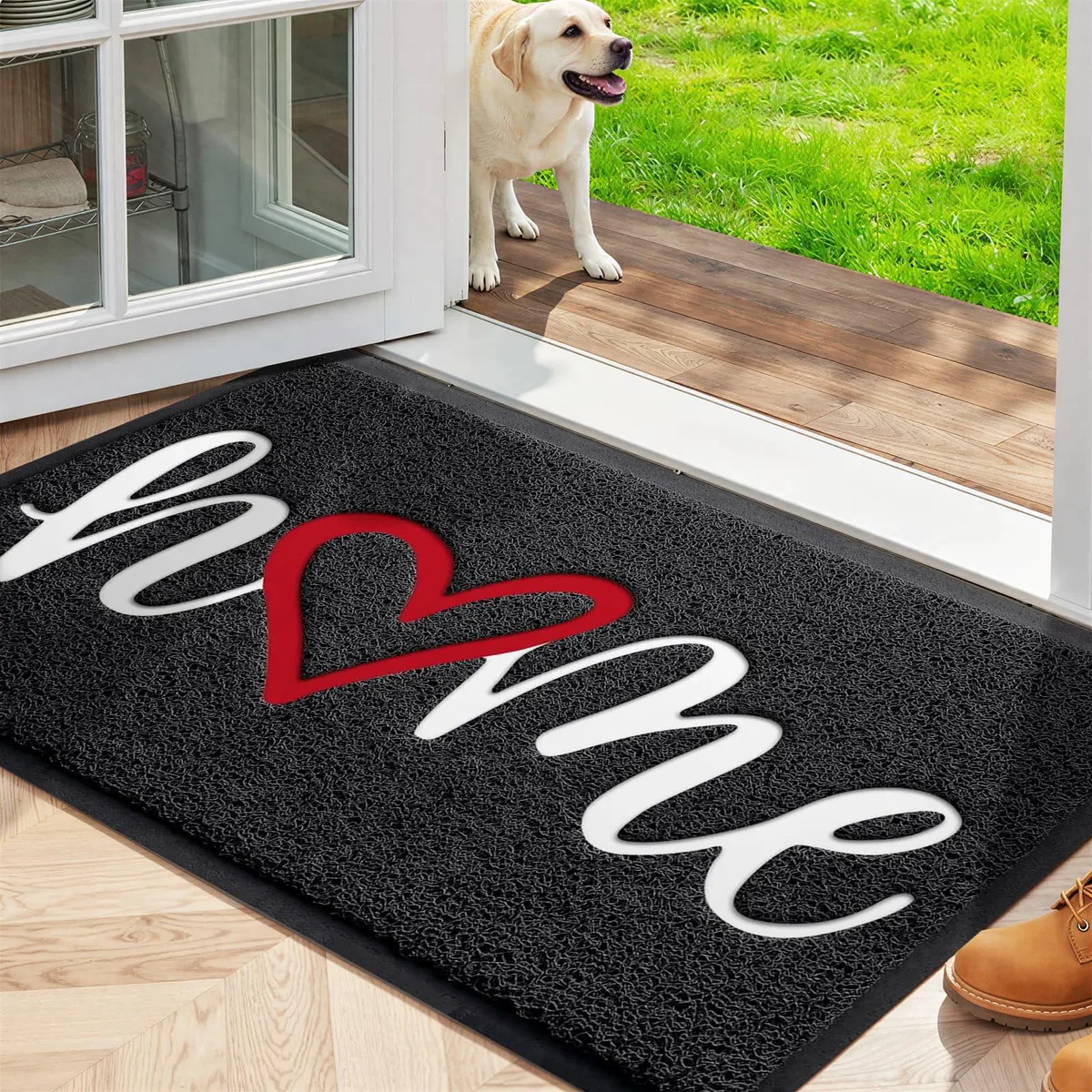 Black rectangular door mat with striped pattern and rubber border, 30 by 17.5 inches