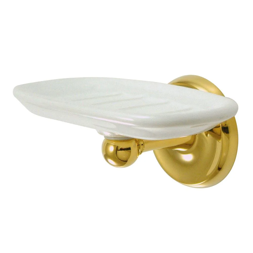 A wall-mounted brass soap dish with a polished golden finish