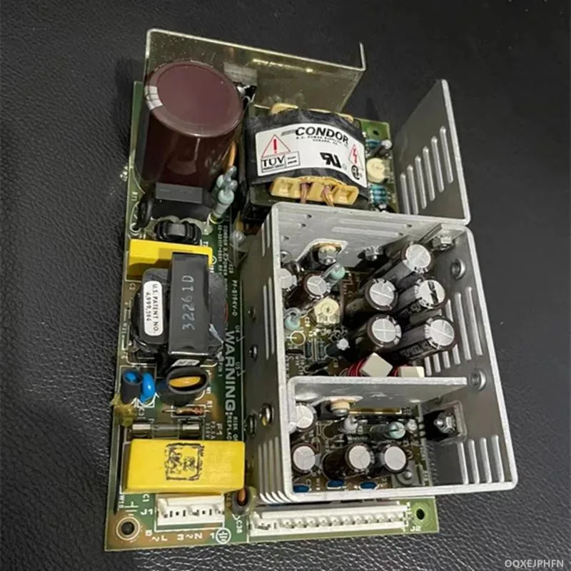 Rectangular ATX power supply unit with matte black finish and cooling fan grille