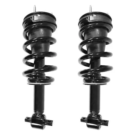 Two silver front strut assemblies with coil springs and top mounts