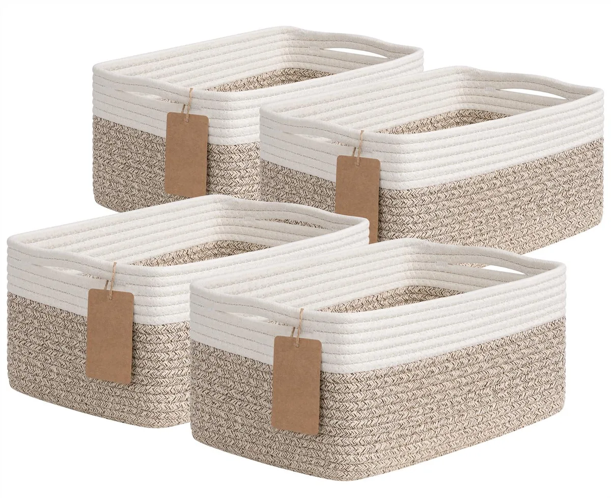 Four rectangular woven baskets in light brown and white cotton with built-in handles and writable tags