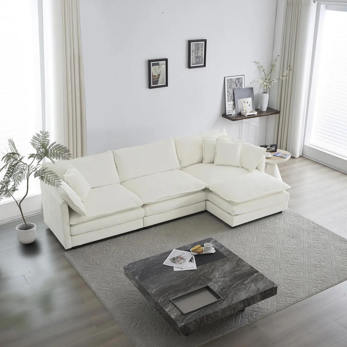 White chenille modular L-shaped sectional with reversible ottoman and loose cushions