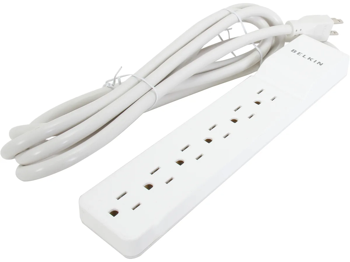 White rectangular surge protector with six outlets and a long power cord