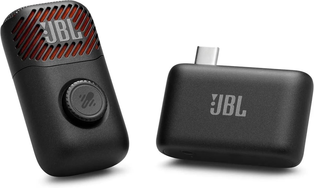 Black pocket-sized wireless microphone with USB-C dongle and charging case