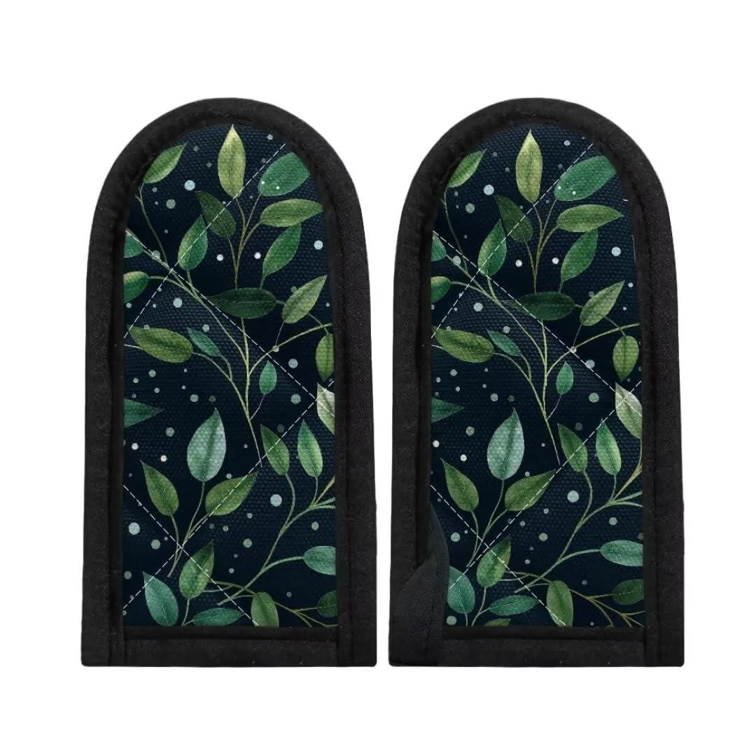 Two quilted polyester hot handle covers in green leaf print