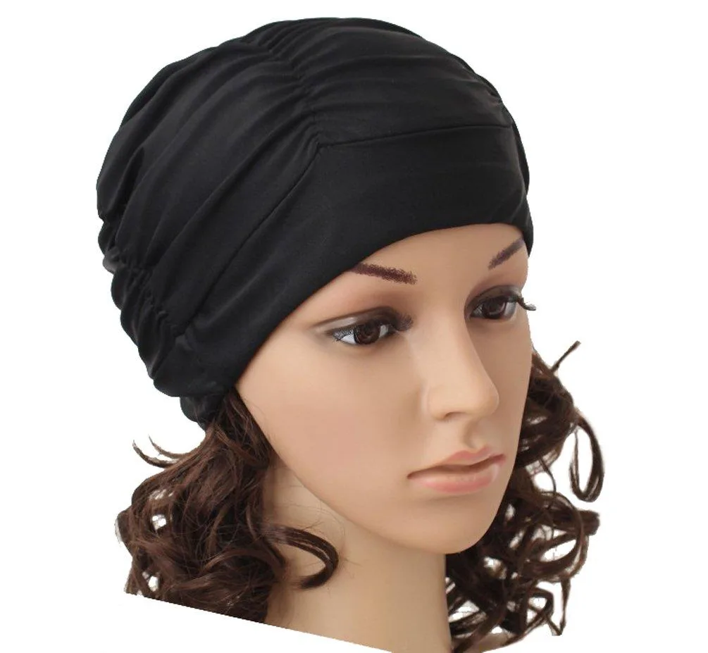 Black pleated nylon swim cap, one size, smooth stretch fabric, folded flat