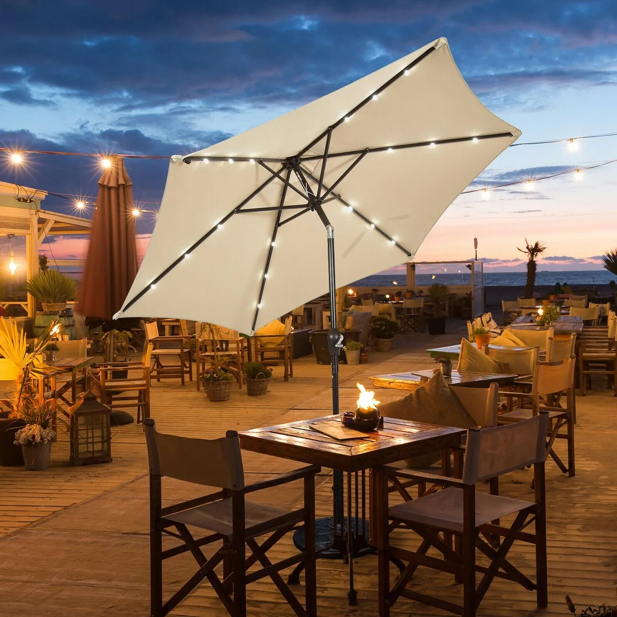 Beige 9 ft patio umbrella with solar LED lights, crank lift and tilt, vented canopy, six ribs