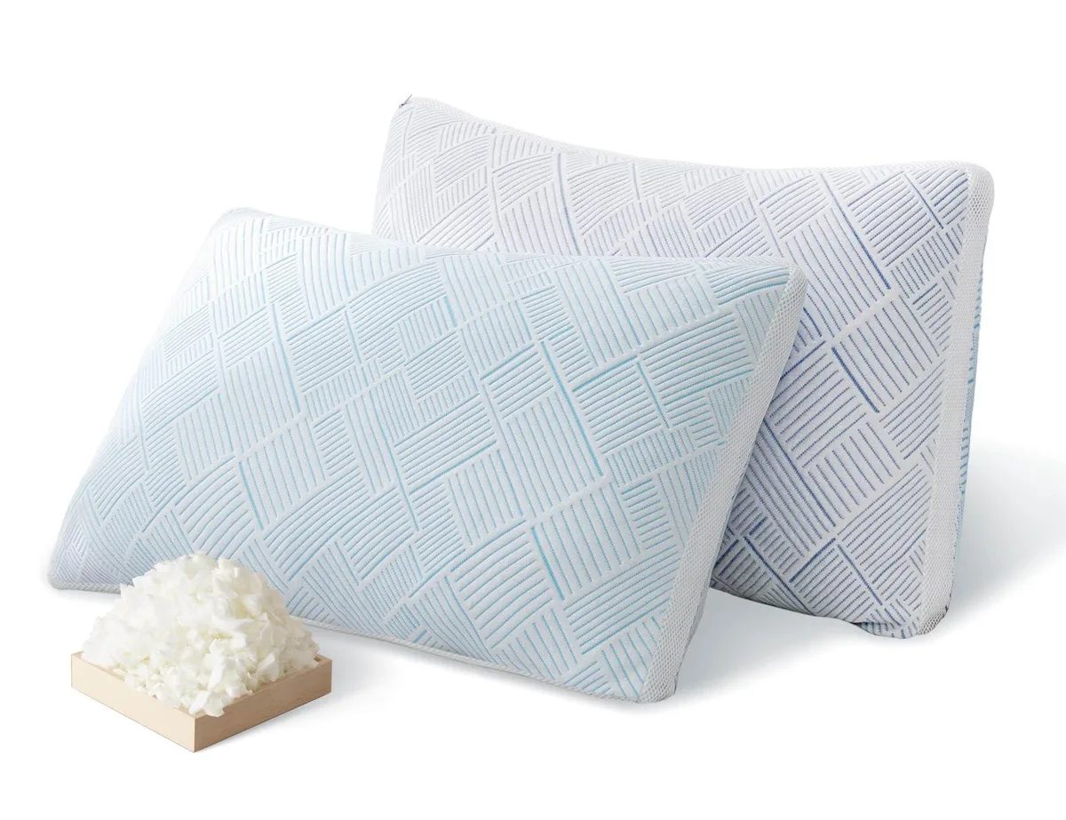 Two white rectangular queen pillows side by side
