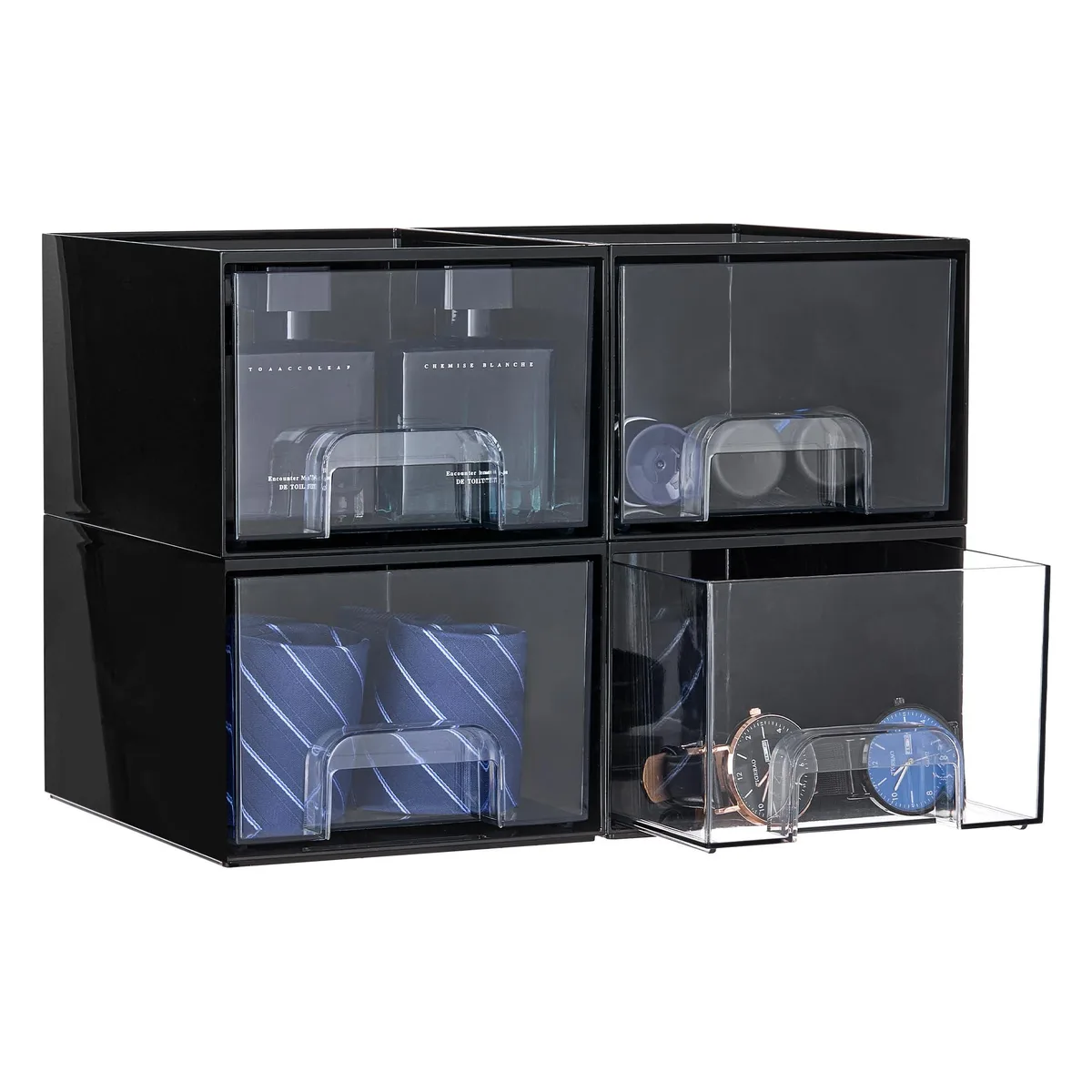 Four black stackable plastic drawers with clear fronts and pull handles