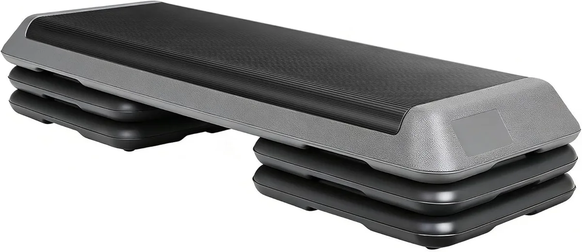 43 inch aerobic step platform with four stackable risers, textured non-slip surface