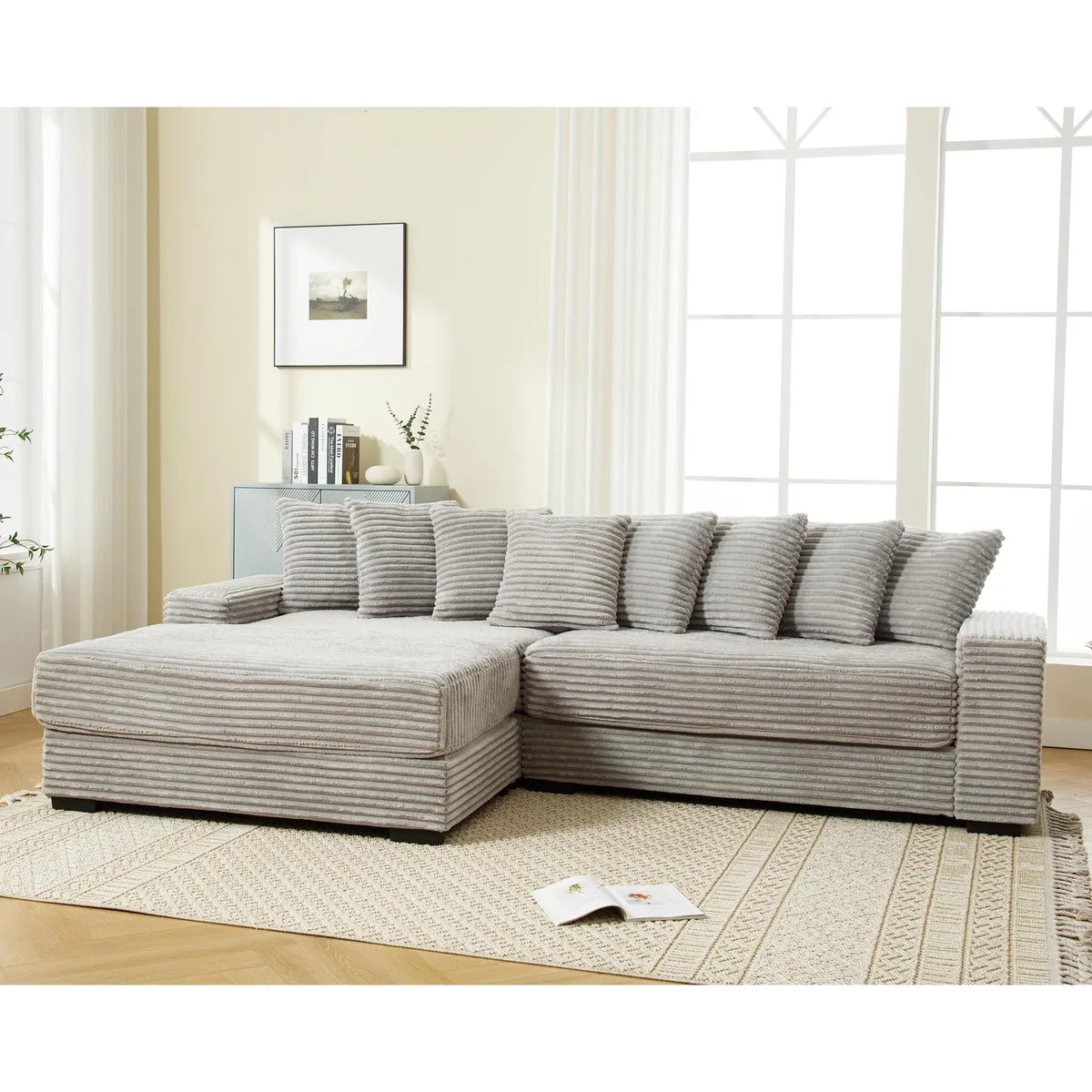 Gray corduroy L-shaped sofa with left chaise and eight matching pillows