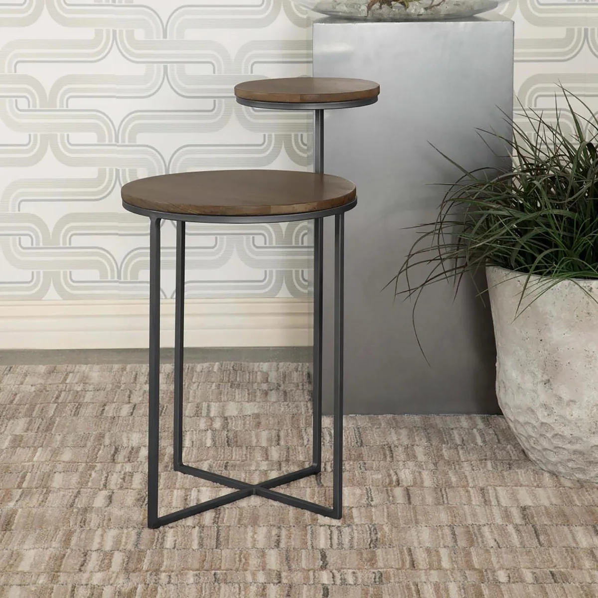 Two-tier occasional table with round natural mango wood tops and gunmetal X-shaped base
