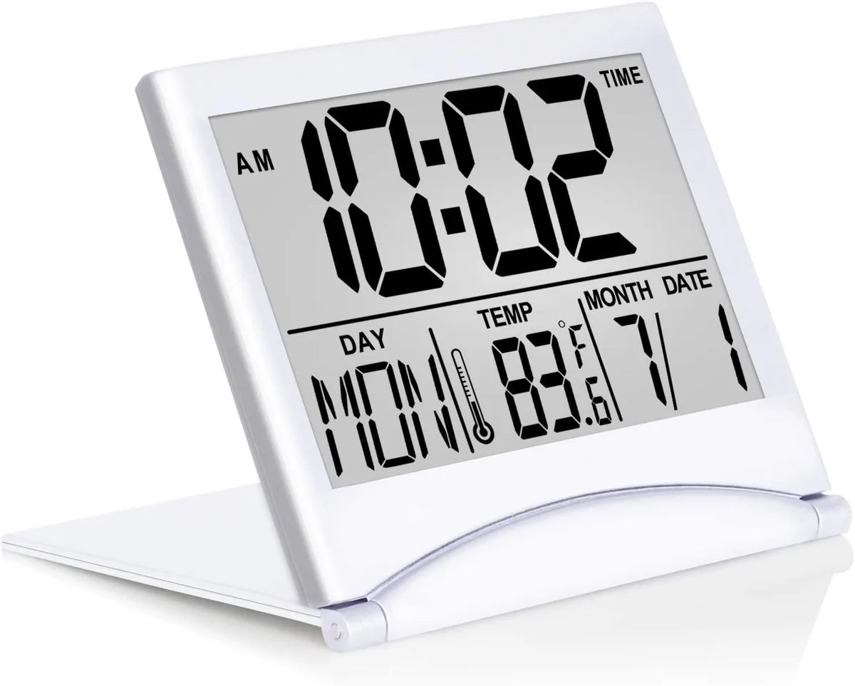 Silver foldable travel clock with large LCD display and stand