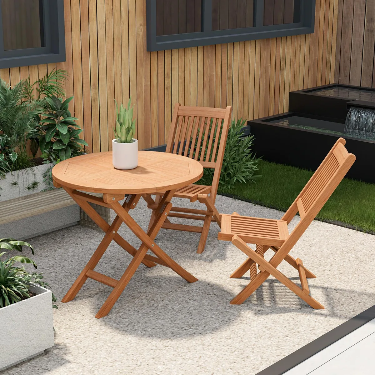 Round folding coffee table in natural teak wood with X-shaped metal base, shown open at 31.5 inch diameter
