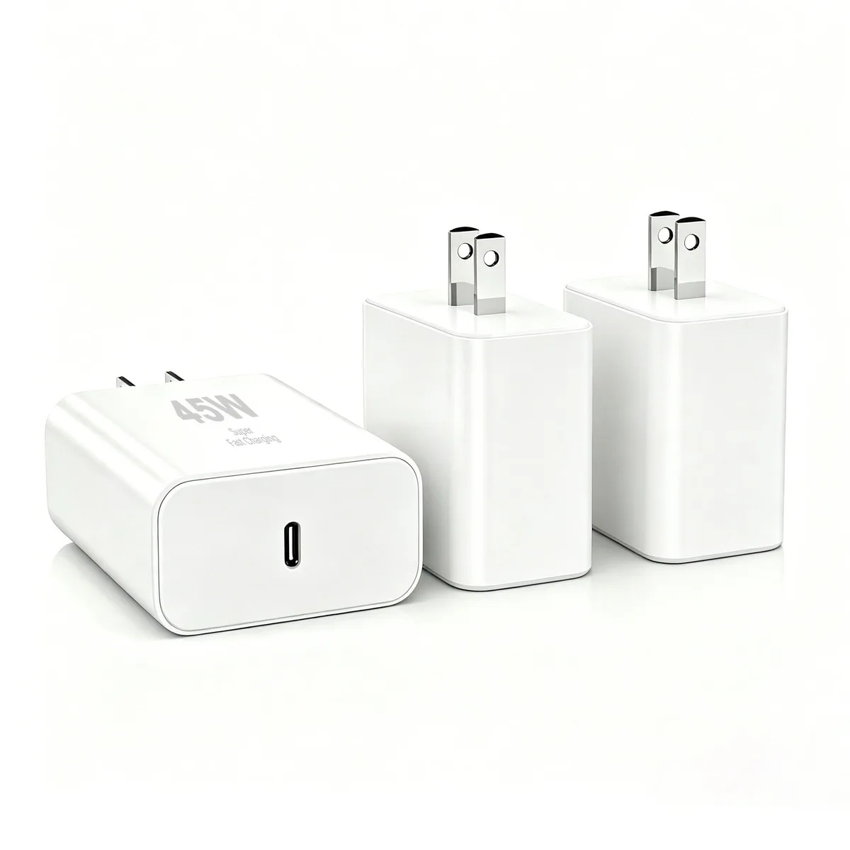 Three white rectangular USB-C wall chargers with foldable prongs