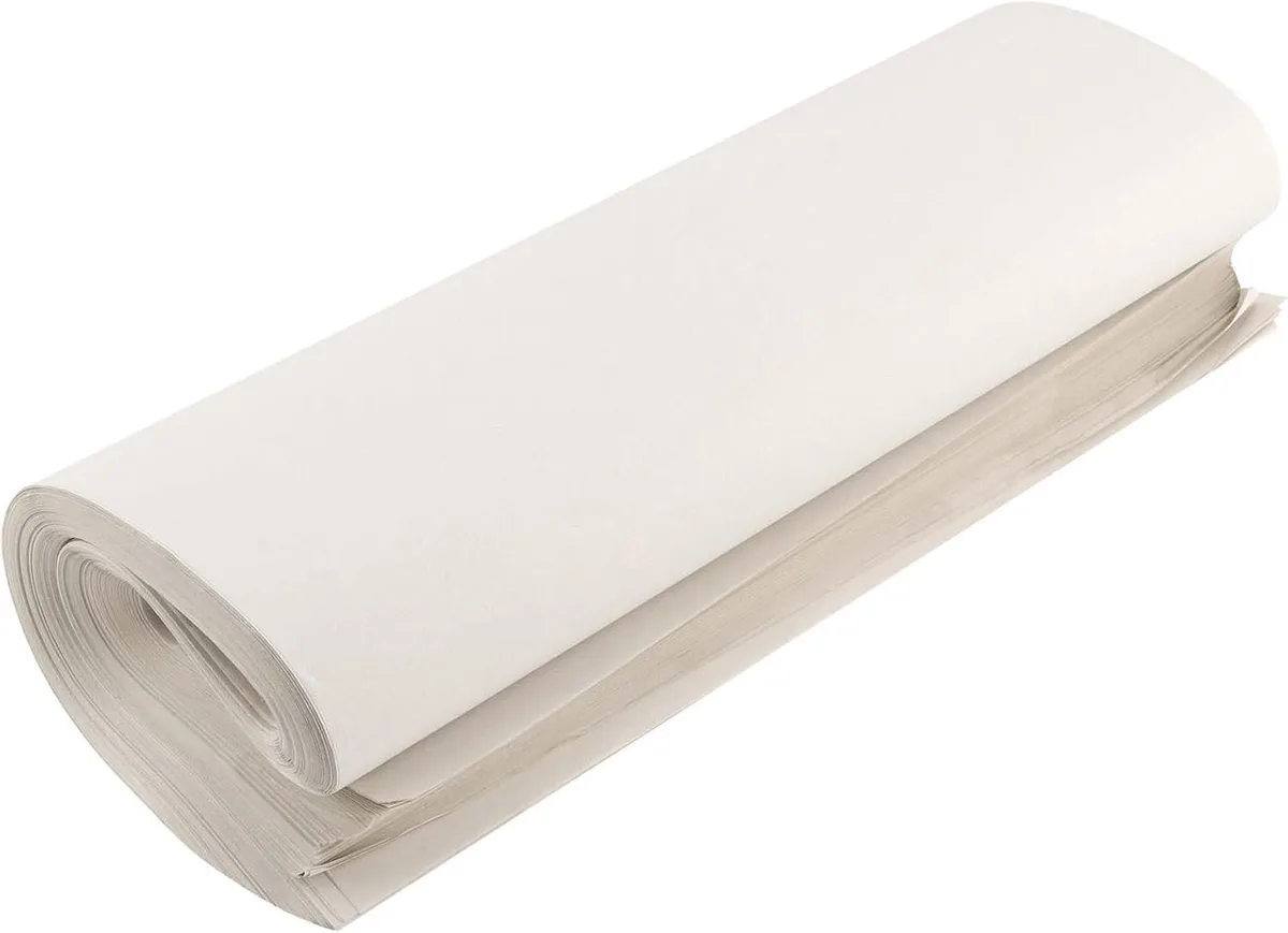 Stack of 50 white newsprint sheets 15 by 26 inches