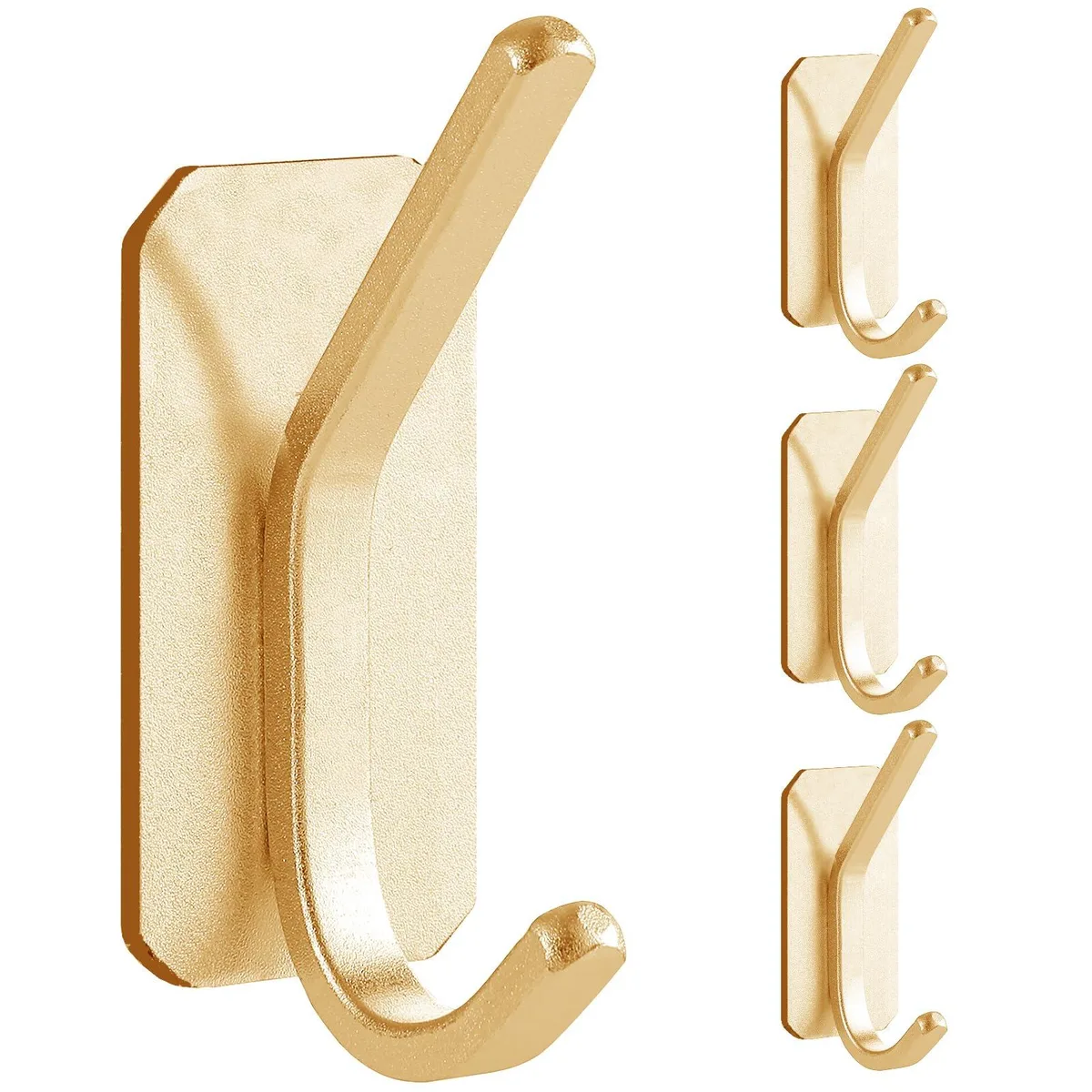 Four matte gold adhesive wall hooks on a backing card