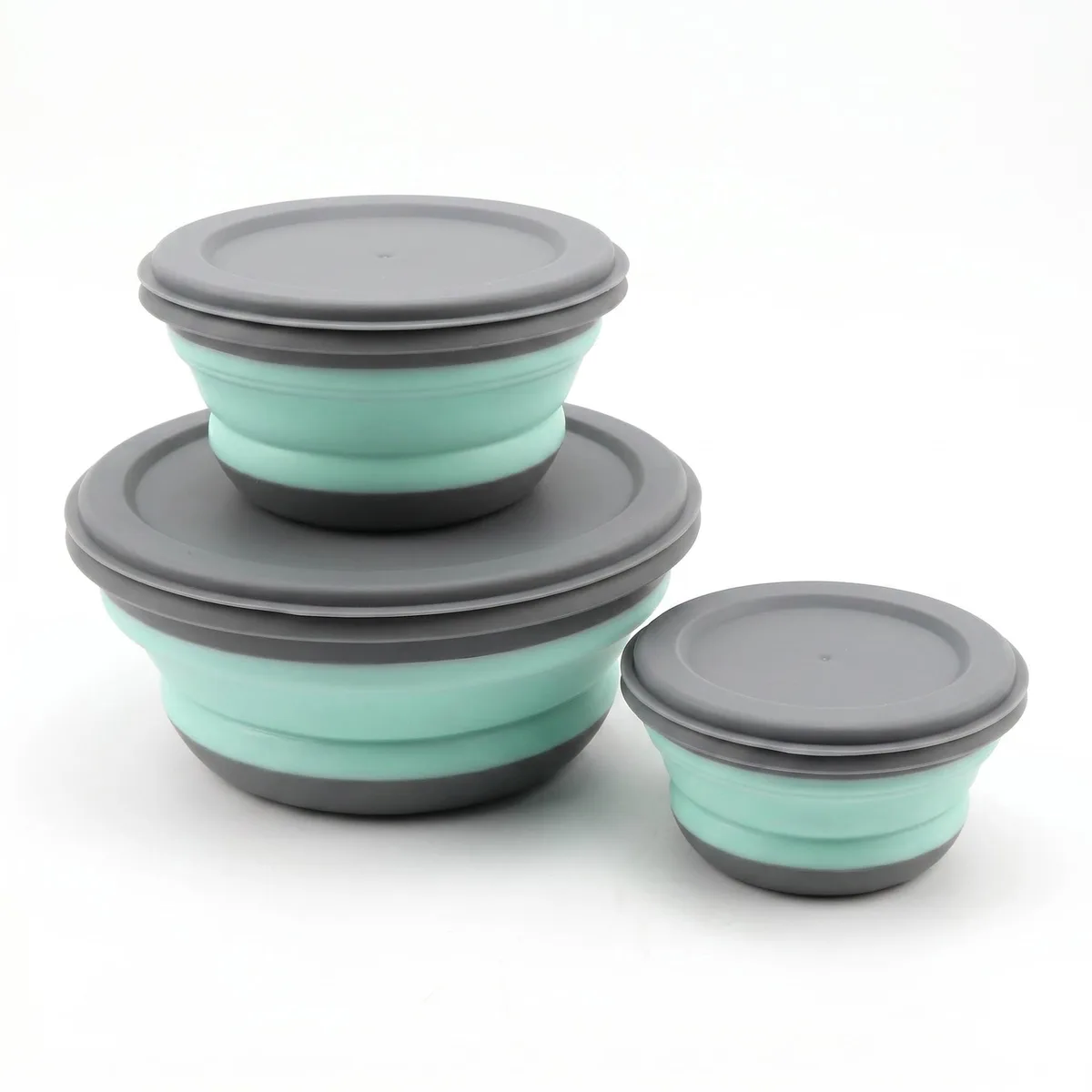 Three collapsible silicone bowls with lids in brown and red, shown folded flat and expanded, 300ml 650ml 900ml sizes