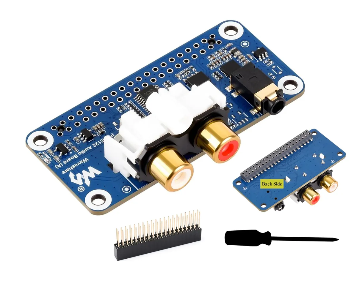 Small green circuit board with 3.5mm jack and red white RCA connectors