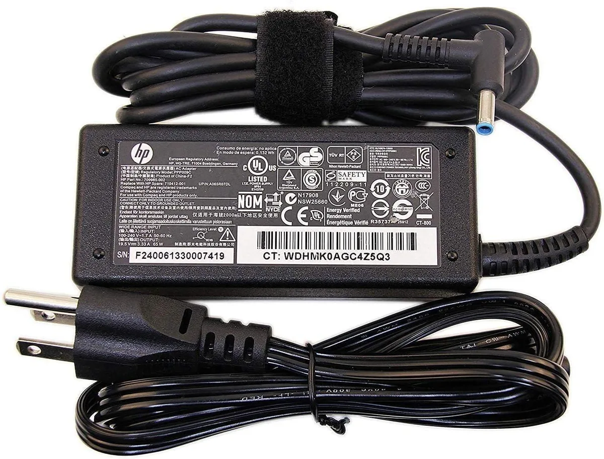 Black rectangular AC adapter with blue-tip barrel connector and US power cord