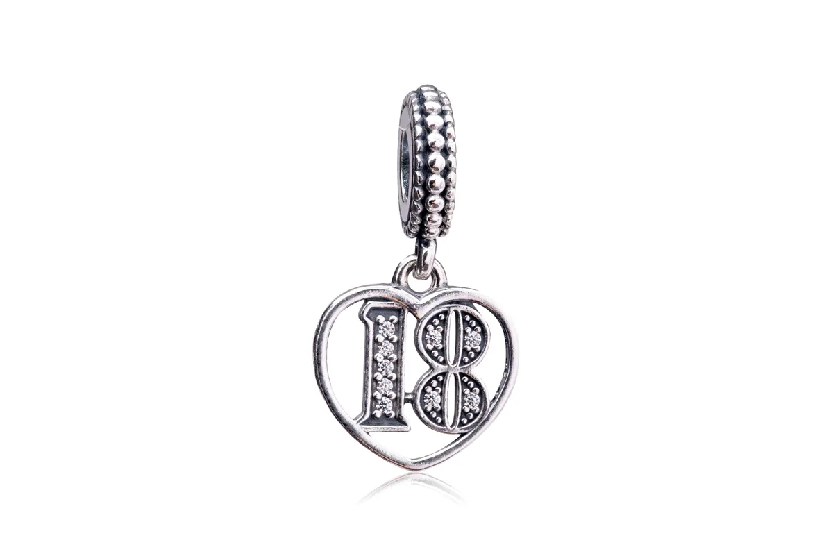 Sterling silver dangle charm with number 18 framed by heart and stone accents