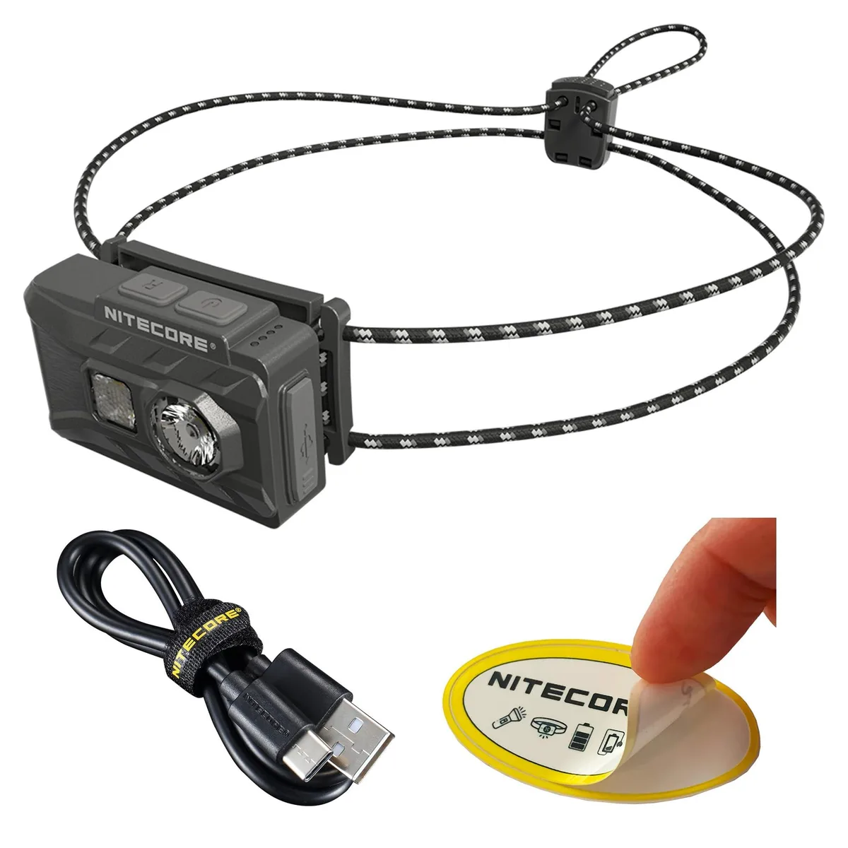 Small rectangular headlamp in matte black polycarbonate with elastic headband and USB-C port