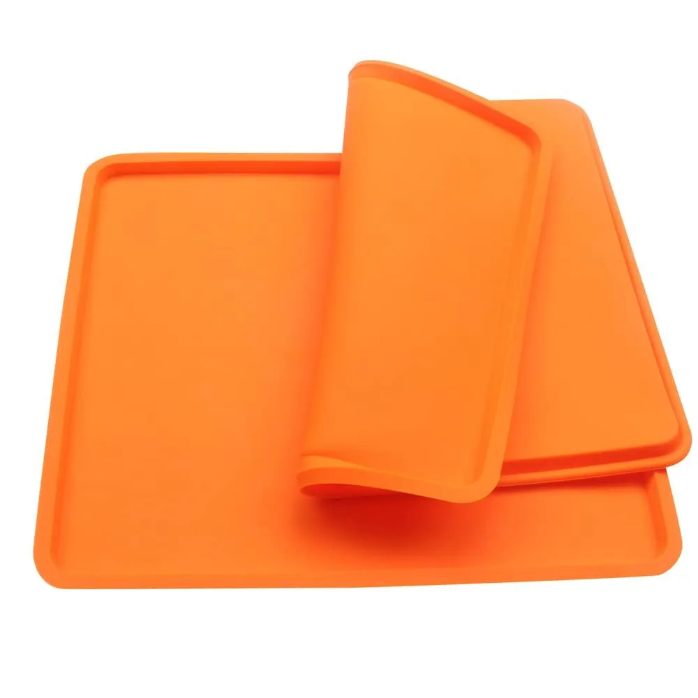 Two orange silicone baking mats 27 by 30 cm nonstick reusable