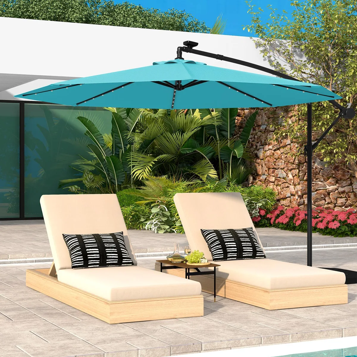Turquoise 10 ft offset patio umbrella with 40 solar LED lights and cross base