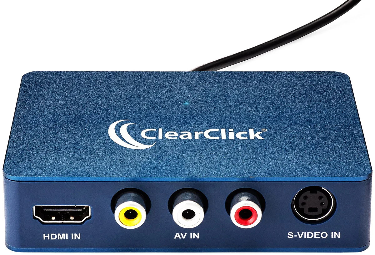 Small rectangular video capture box with HDMI, AV and S-Video ports, USB-C cable and USB-A adapter, matte black finish